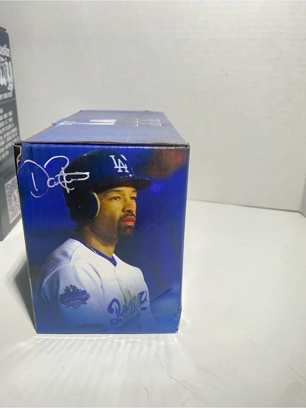 Dave Roberts and Dustin May bobble heads
